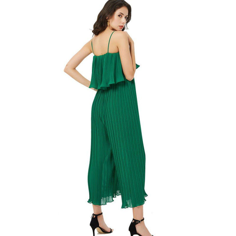 Plisserad jumpsuit med volang och vida ben