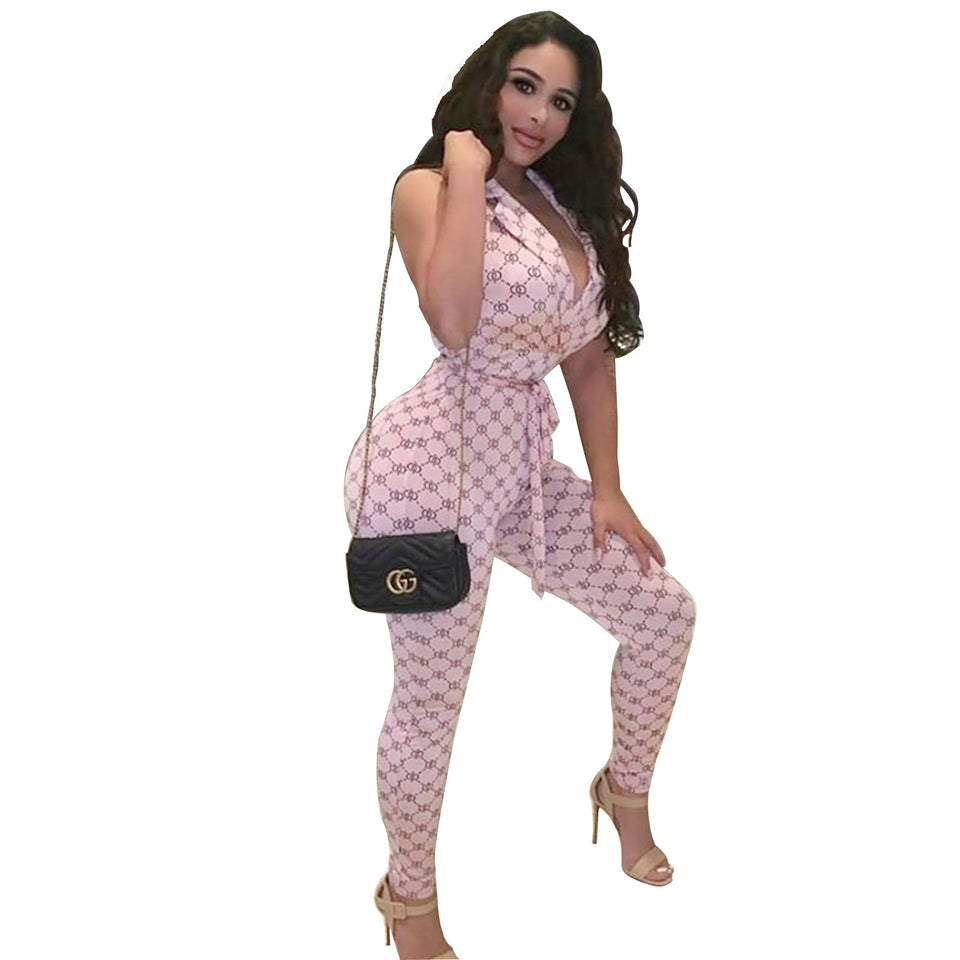 Mönstrad halterneck-jumpsuit med djup v-ringning