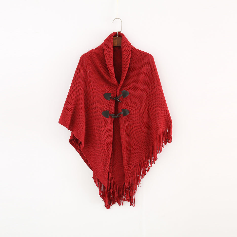 Stickad poncho med huva