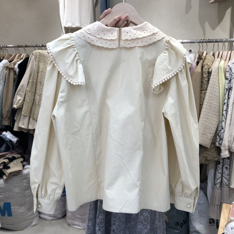 Romantisk blus med spetskrage och puffrmar