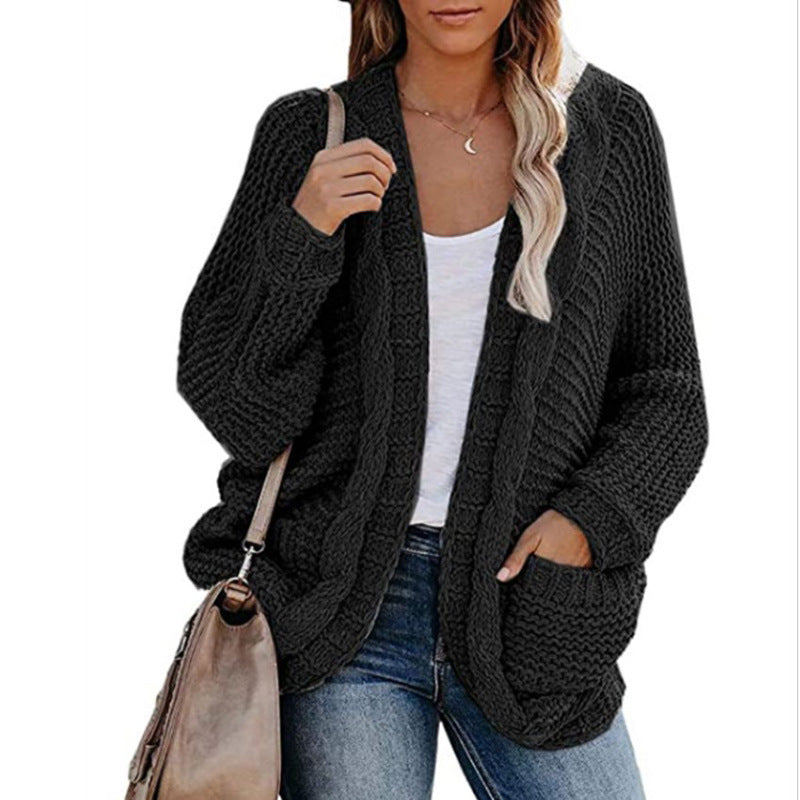 Grovstickad oversize-kofta med fickor