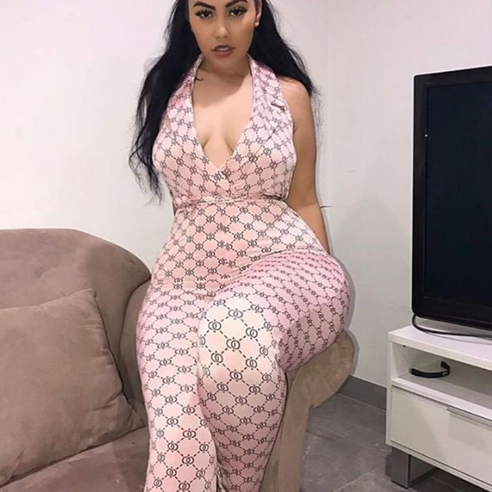 Mönstrad halterneck-jumpsuit med djup v-ringning