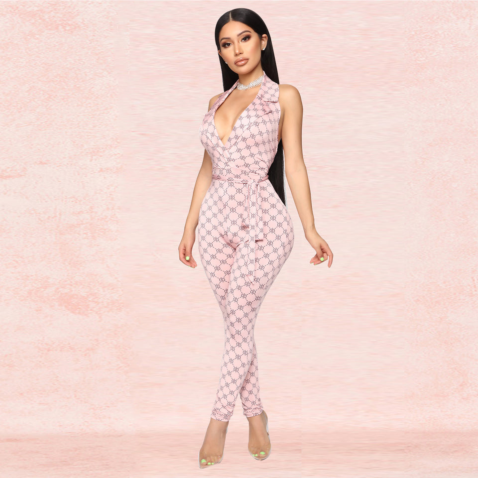 Mönstrad halterneck-jumpsuit med djup v-ringning