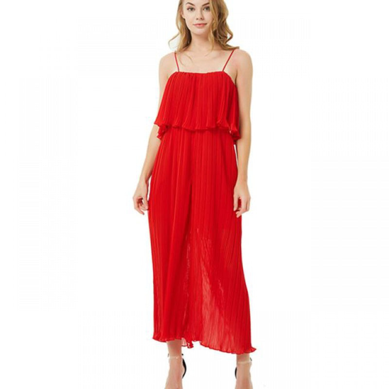 Plisserad jumpsuit med volang och vida ben