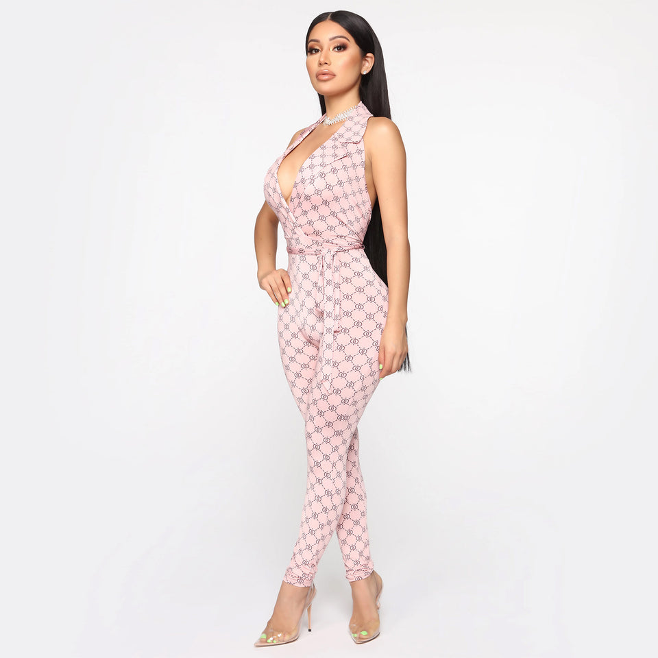 Mönstrad halterneck-jumpsuit med djup v-ringning