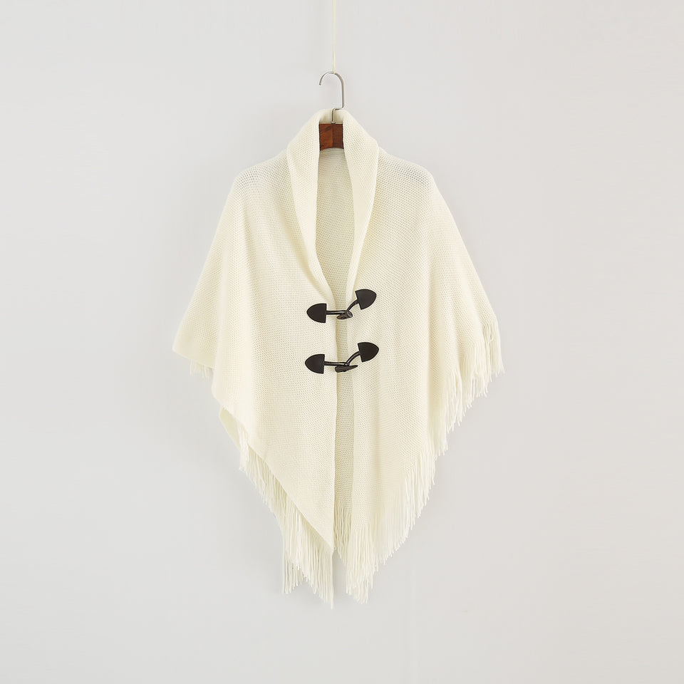 Stickad poncho med huva