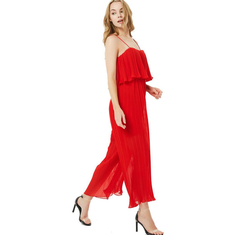 Plisserad jumpsuit med volang och vida ben
