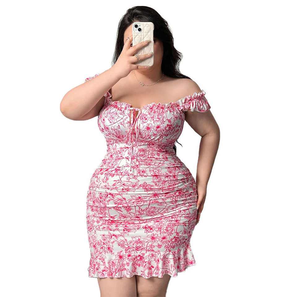 Blommig offshoulder-klänning med volang – plus size