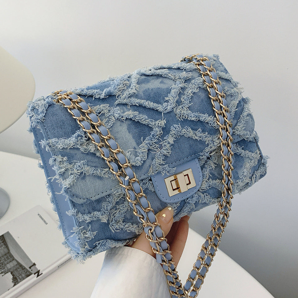Denimväska crossbody med kedjeremsa