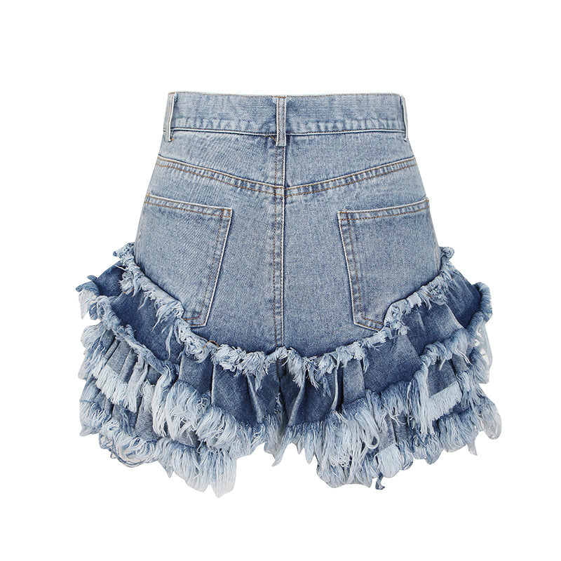 Jeansshorts med fransad volangkant