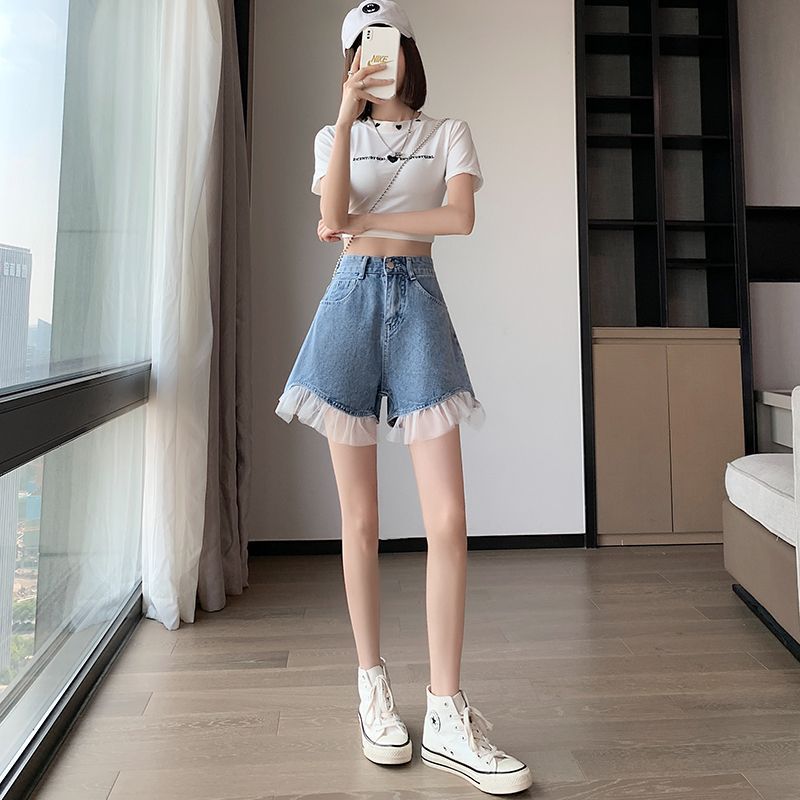 Jeansshorts med hög midja och spetskant