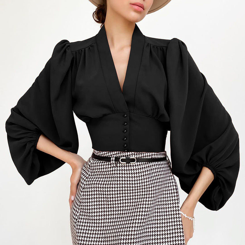 Elegant blus med V-ringning och lyktärm