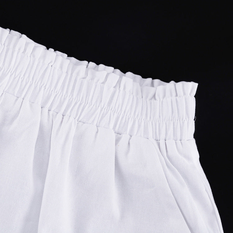 Vitt set med volangtopp och shorts i linnemix