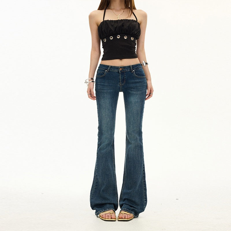 Mörkblå utsvängda jeans med broderi