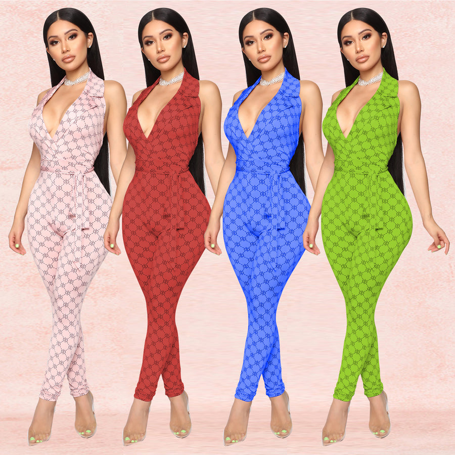 Mönstrad halterneck-jumpsuit med djup v-ringning