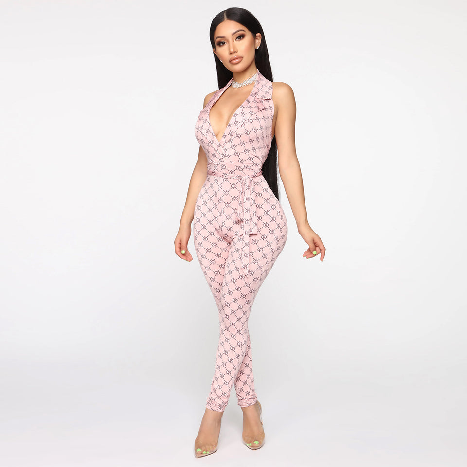 Mönstrad halterneck-jumpsuit med djup v-ringning
