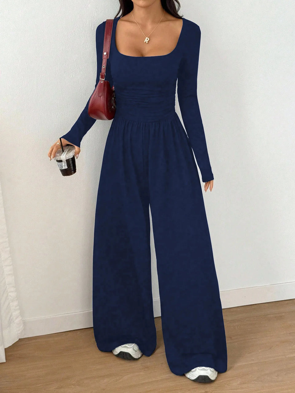 Jumpsuit med fyrkantig ringning och vida ben