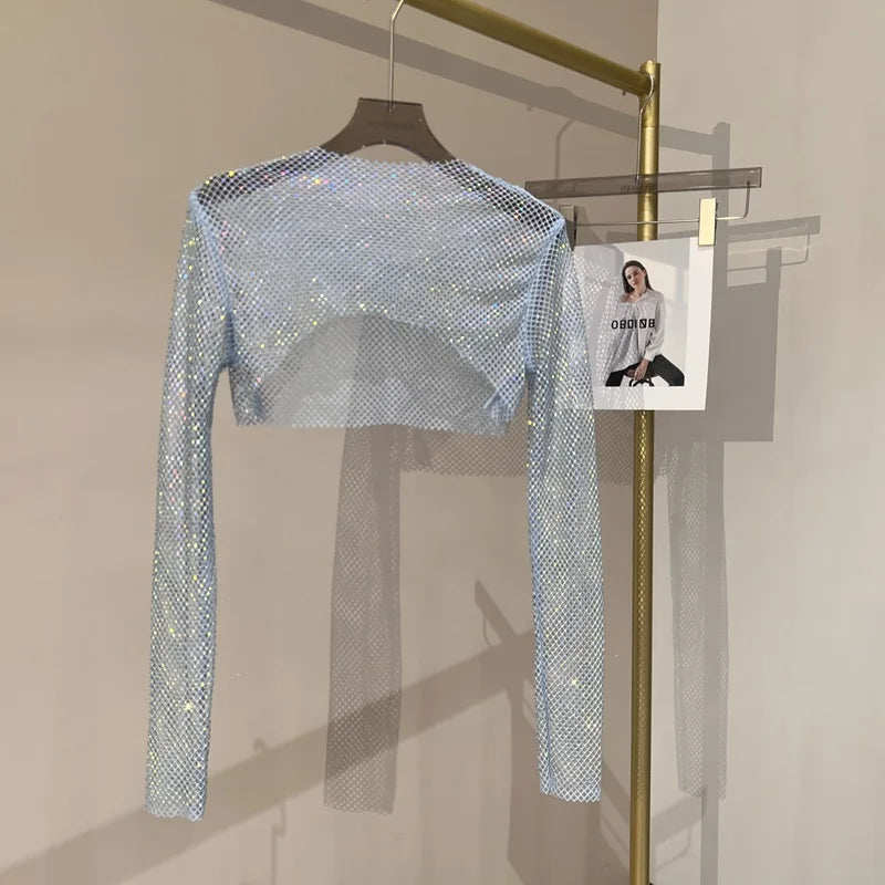 Kort nättopp med strass och långa ärmar