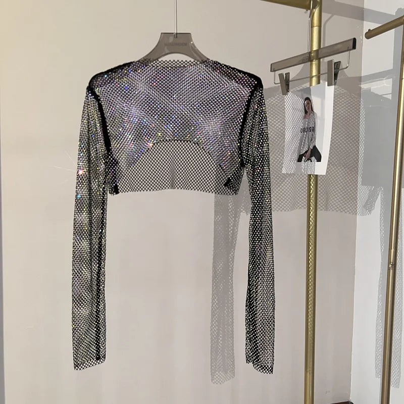 Kort nättopp med strass och långa ärmar