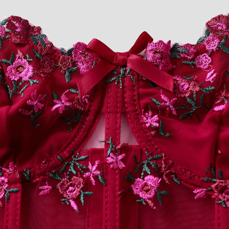 Vinröd korsettopp med broderade blommor