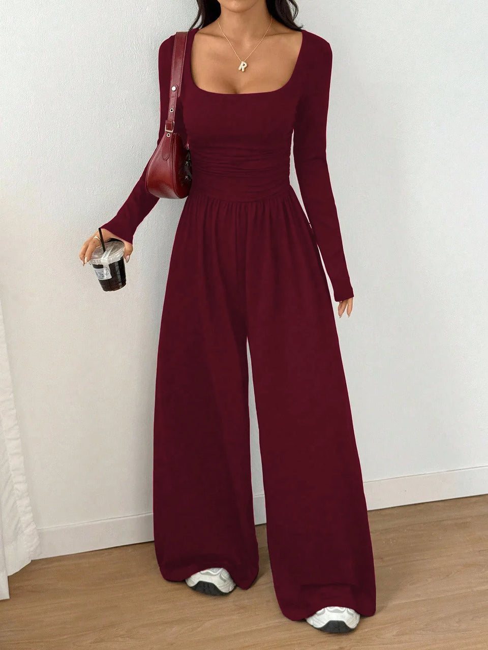 Jumpsuit med fyrkantig ringning och vida ben
