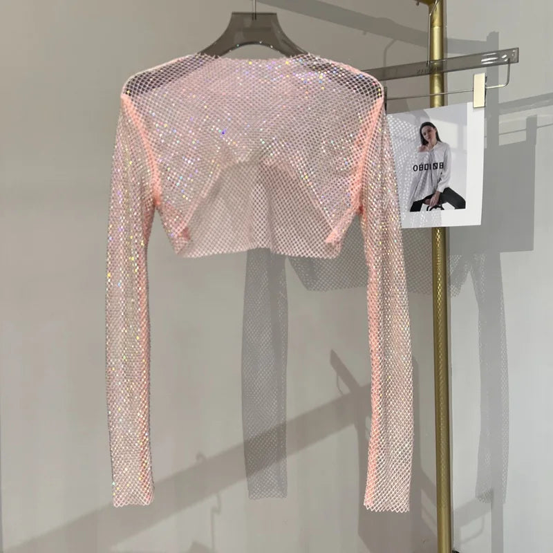 Kort nättopp med strass och långa ärmar