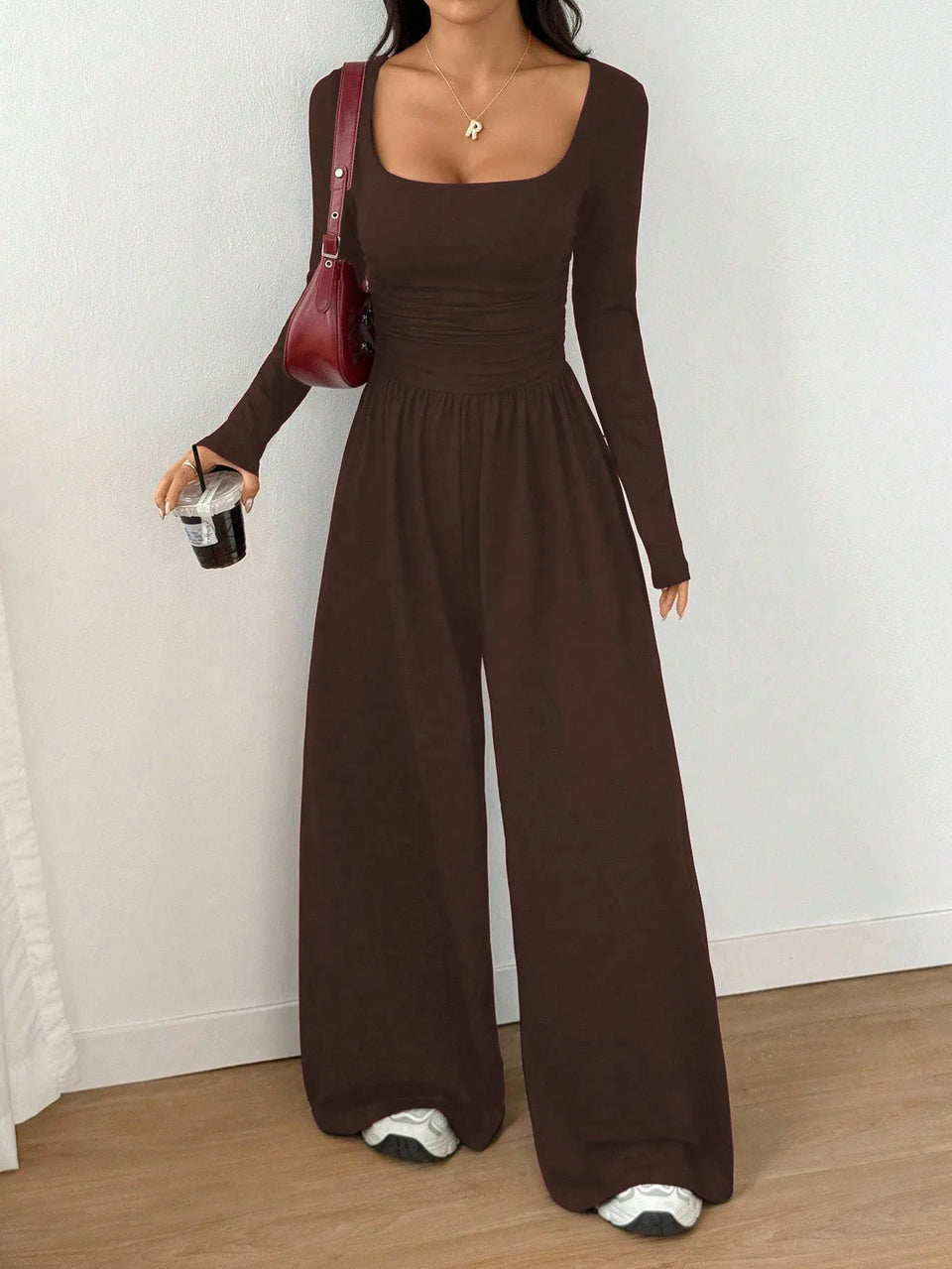 Jumpsuit med fyrkantig ringning och vida ben