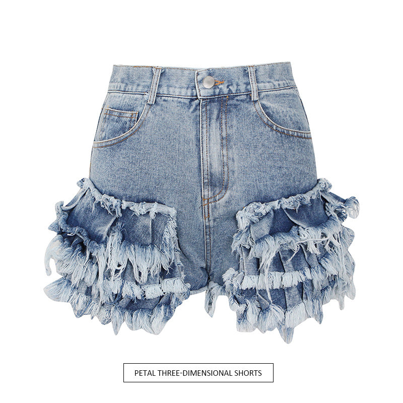 Jeansshorts med fransad volangkant