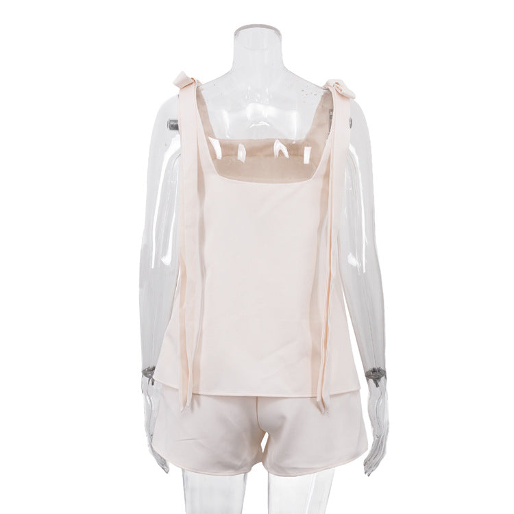 Set med linne med rosetter och shorts